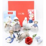 A collection of Nao figures, boxed, booklet and rose (10)
