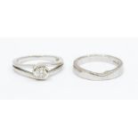 A 18ct white gold solitaire diamond ring, claw set round brilliant cut of approx 0.20ct, total gross
