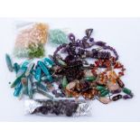 A collection of semi precious  stone bead jewellery to include a garnet bead necklace, an amethyst