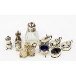 A  collection of assorted silver including a cruet part set; large silver covered glass casters;