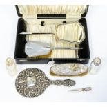 An Edward VIII Art Deco boxed silver dressing table brush set, Birmingham 1936 comprising; mirror