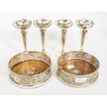 A pair of Edwardian silver plated wine coasters, pierced swag decoration, diameter 14.5cms approx,