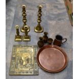 A collection of assorted brass ware comprising a pair of early 19th Century candlesticks, with