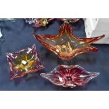 Three coloured studio glass bowls