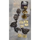 A collection of metal wares including scales, battery mantle clock, candlesticks, drawer and