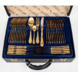 A Bestecke Solingen canteen of cutlery, gold plated and stainless steel, comprising twelve place