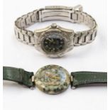 A ladies Tissot 'Rockwatch ' R150 wristwatch comprising a speckled green granite dial, red and