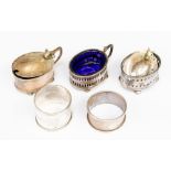 A collection of silver to include: Georgian style salts and mustard pot with detached cover and