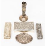 A collection of silver to include: Edwardian shaped oval pin tray the central chased with a Cat