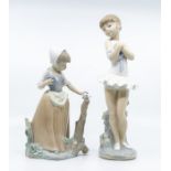 Two Nao figures, ballet dancer and girl with a butterfly