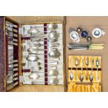 A collection of plate including a cased set of flatware, strainer, cruet set, boxed set of shell