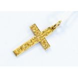 A 15ct gold cross pendant, hallmarked for Chester, engraved floral foliage decoration, length approx