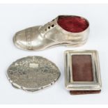 An early 20th Century silver large shoe shaped pin cushion, date letter u possibly, Birmingham 1919,