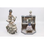 Two Lladro figures, one is a girl playing piano and the other is a Flamenco dancer (AF)
