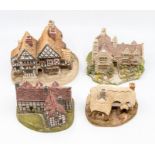 A Lillyput Lane collection of four cottages including Red Lion, Armada House, Ostlers Keep,