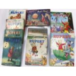 A collection of eight Rupert annuals, 1950's to include Magic Painting, together with Cinderella,