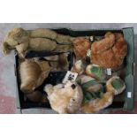 An early 20th Century teddy bear, a Harrods Millenniu, bear with box, a Harrods ten teddies