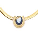 A 9ct gold collar with an oval central cameo detail of Cesar, the garland set with small diamonds,