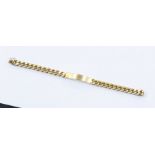 An 18ct gold curb ID bracelet, width approx 8mm length approx 21cm, box clasp with figure of 8