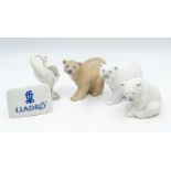 Six Lladro bears, Lladro goose and plaque