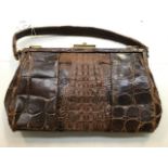 An early 20th Century crocodile ladies handbag