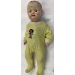 Three vintage dolls : British made celluloid 24inches tall, composition doll 26 inches tall,and