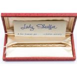 A Lady Sheaffer gold plated fountain pen with cross hatch decoration and matt finish cased