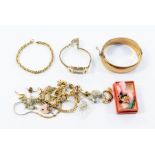 A collection of jewellery to include a 9ct bangle, engraved to the front, weight approx .23gms,