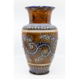 A Victorian Doulton Lambeth stone ware vase, hand painted and enamelled decoration, on a brown