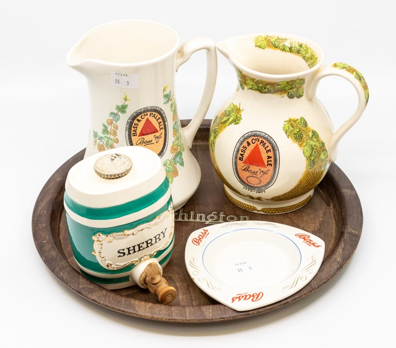 A collection of brewery advertising items including Bass & Co Pale Ale water jugs, Bass ashtray,
