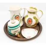 A collection of brewery advertising items including Bass & Co Pale Ale water jugs, Bass ashtray,