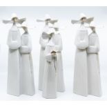 Four Lladro figures of nuns