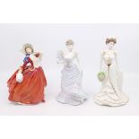 Two Coalport figures of ladies and a Royal Doulton lady, Autumn Breezes