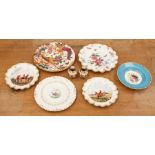 A collection of Royal Crown Derby plates, including hand painted hunting scenes by CM Pall, along