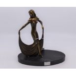 A bronze figure of an Art Deco style lady, raised on plinth base, signe A Niaion, 23.5cms approx