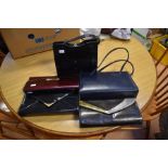 Two vintage ladies handbags, plus three clutch bags, leather and leatherette