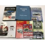 A collection of seven Triumph books and a workshop manual