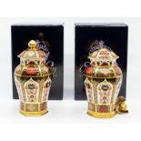 Two 1128 lidded Royal Crown Derby vases with boxes, one is AF