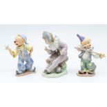 Nao figure of a clown and two other figures of clowns