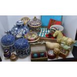 A varied collection of modern Oriental items including ginger jars, a large blue teapot, a resin