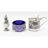 An Edwardian silver condiment set, in the Neo Classical style, comprising mustard pot and salt