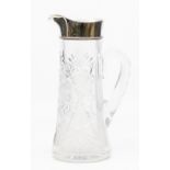 A George V silver mounted hob nail cut water jug, the plain silver mount with beaded collar by