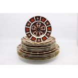 A collection of Royal Crown Derby 1128 small, medium and large plates including fan plates, first