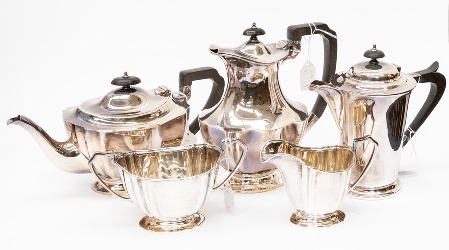 A silver plated four piece tea and coffe service, comprising teapot, milk jug, sugar bowl, coffee