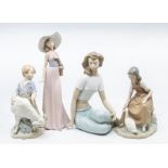 Four Nao figures of young ladies and boy with girl