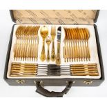 A Bestecke Solingen 12 place canteen of cutlery, gold plated and stainless steel, the case having