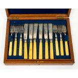 A Victorian silver and bone handled 12 piece fish knives and forks, (10 silver bladed knives only