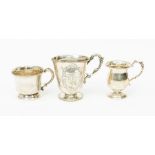 A collection of silver mugs to include: Victorian example with geometric engraved decoration, by WH,