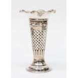 An Edwardian silver trumpet shaped vase with flared rim, the body with openwork geometric pattern on