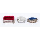 A group of three early 20th Century various silver ring boxes to include: a combination shaped